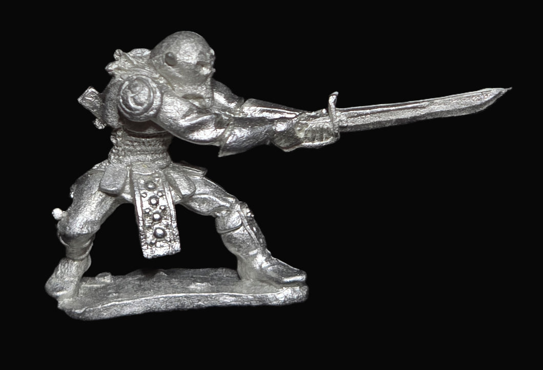 51-5807:  Half-Orc with Greatsword, Striking