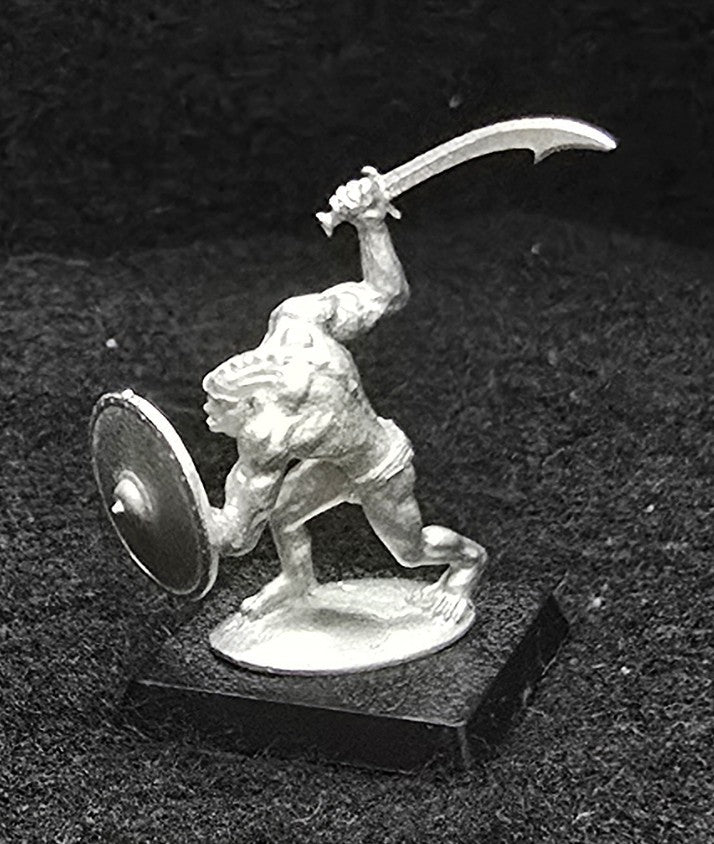 51-9034:  Unarmored Goblin Advancing, Weapon Raised