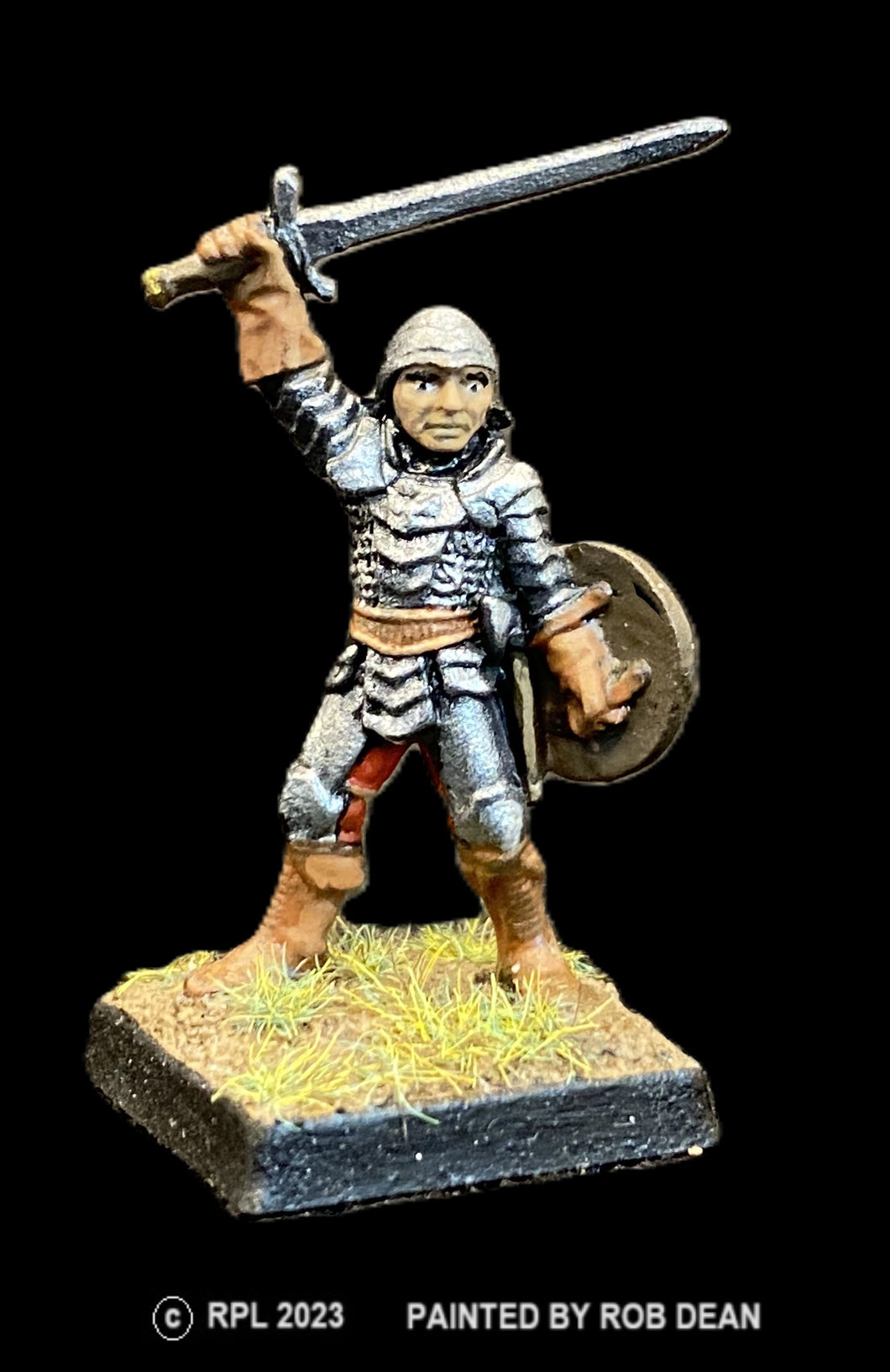 52-0004:  Adventurer with Sword and Round Shield IV