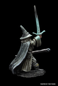 52-0507:  Wizard with Sword Raised, Staff Forward