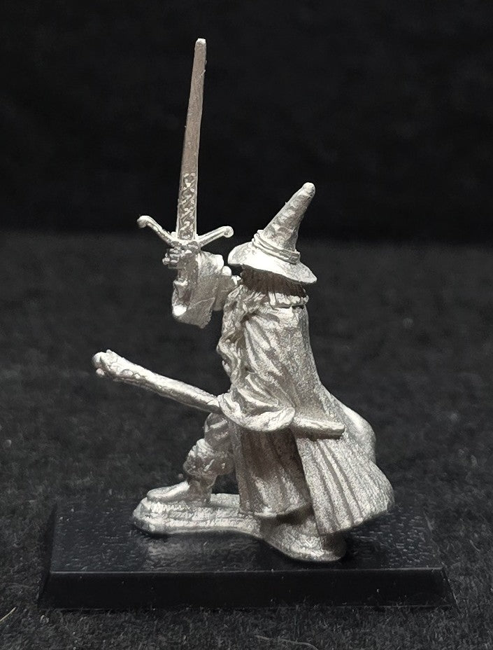 52-0507:  Wizard with Sword Raised, Staff Forward