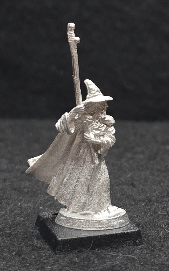 52-0508:  Wizard with Staff Raised High Over Shoulder