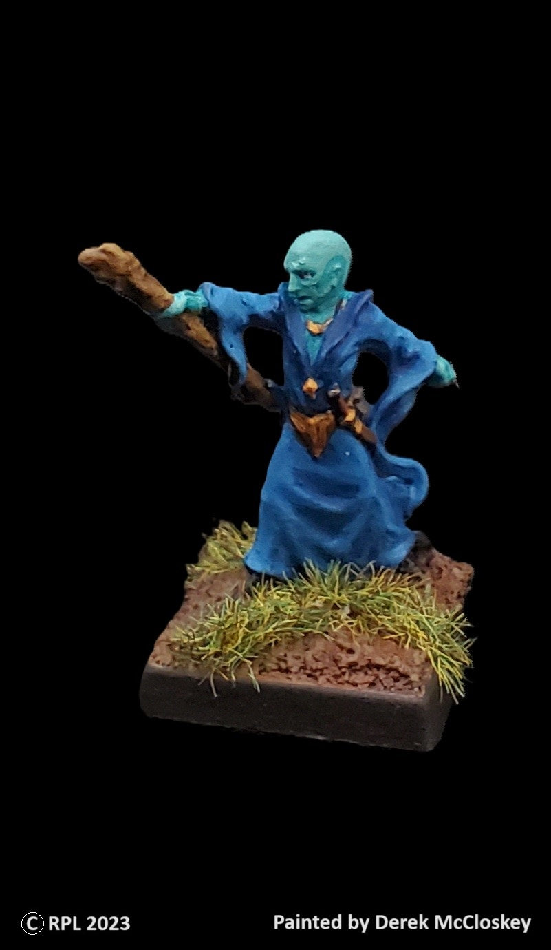 52-0522:  Sorcerer Casting with Staff, Bald Head
