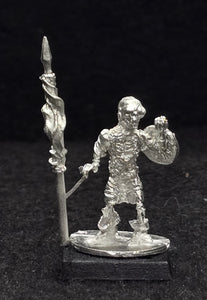 57-0703:  Skeleton with Two Handed Weapon and Round Shield