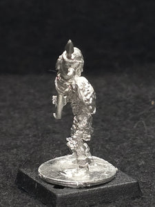 57-0703:  Skeleton with Two Handed Weapon and Round Shield