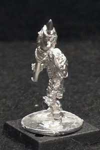 57-0703:  Skeleton with Two Handed Weapon and Round Shield