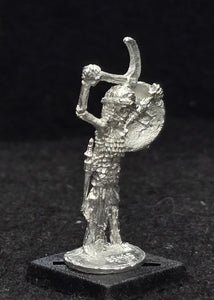 57-0717:  Skeleton with Sickle and Shield, Longer Garment
