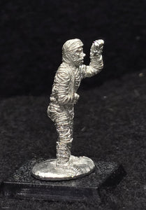 57-0772:  Mummy Advancing, Arm Raised