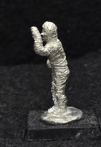57-0772:  Mummy Advancing, Arm Raised