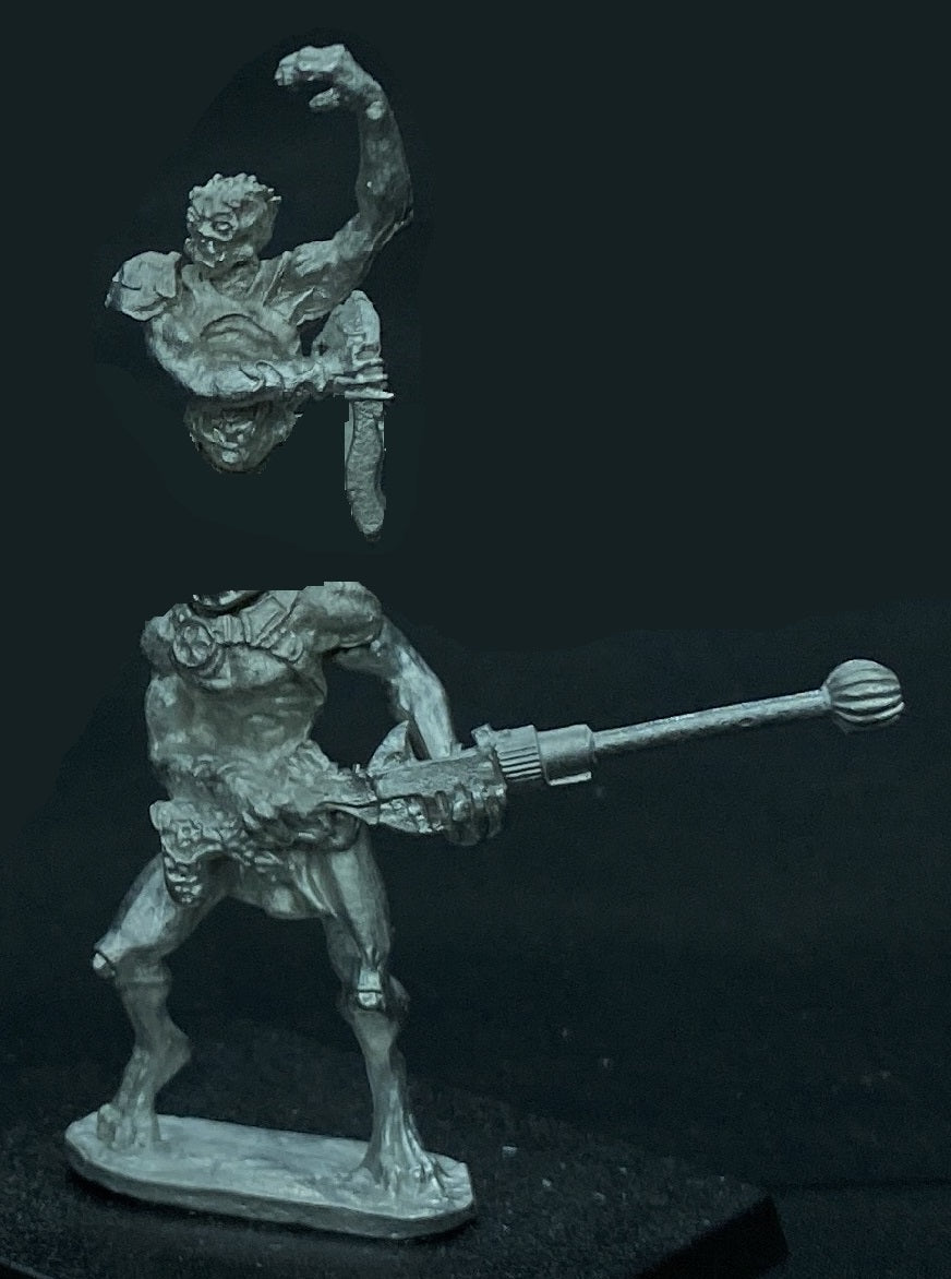 58-2086:  Wastelander Biped with Radium Gun, Armored, Open Left Hand Overhead, Dagger in Right Hand